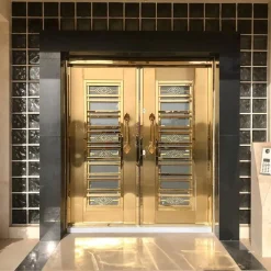 درب استیل طلایی دو لنگه با شیشه دکوراتیو – مدل لاکچری فانوس دیزاین